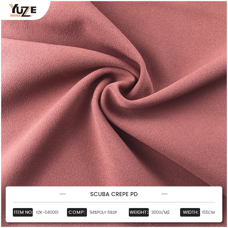 Mitkä ovat Moss Crepe -kankaan sovellusetuja Haute Couturen alalla, ja miten se voi tuoda ainutlaatuisen kokemuksen suunnittelijoille ja kuluttajille?